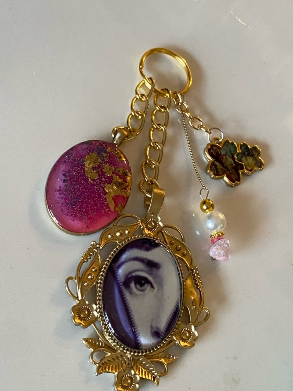 BAG CHARM KEYCHAIN PURSE ACCESSORIE FORNASETTI EVIL EYE PINK PURPLE FLORAL GOLD - Picture 5 of 6